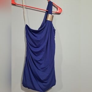 Casual blue top with one strap and metal embellishment
